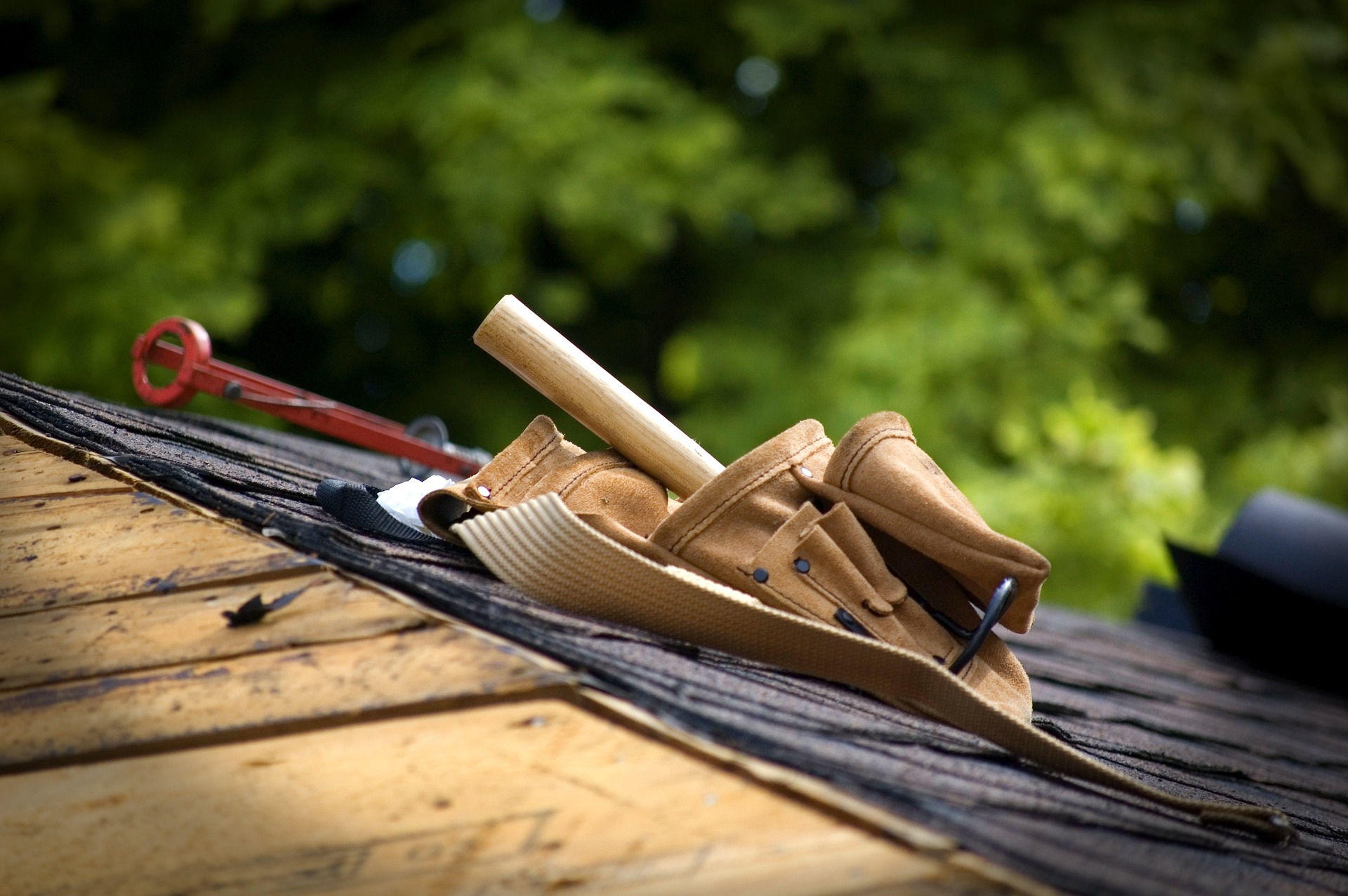 A roof repair tool is sitting on top of a roof.